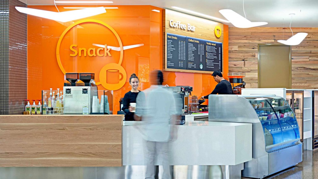 A chef standing behind a counter.