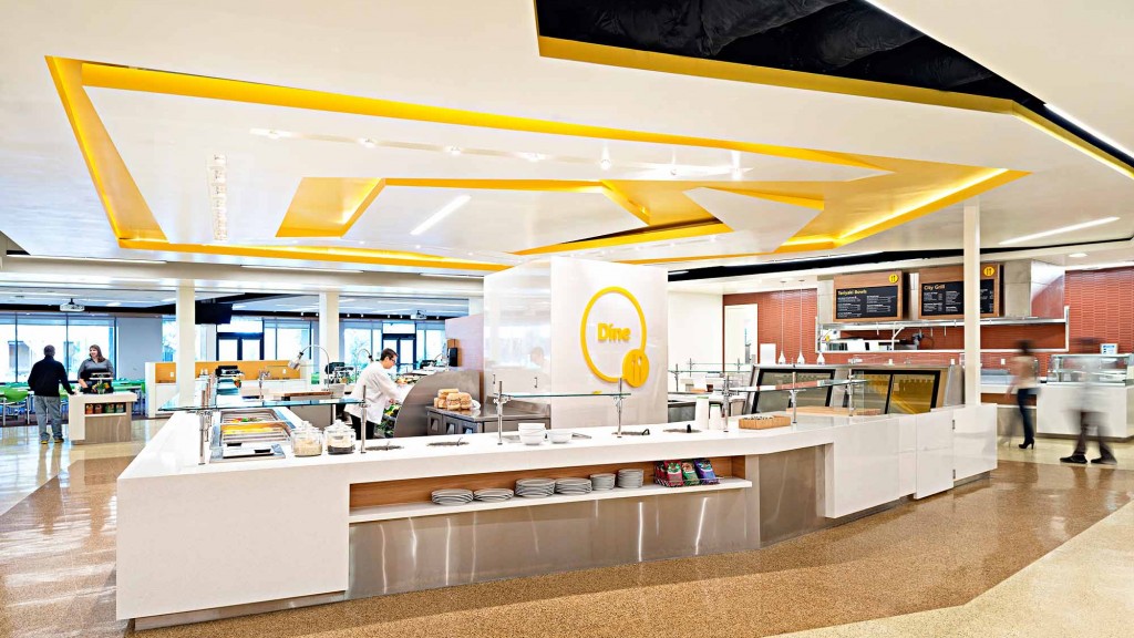 A large room with a large counter and a large yellow circle.