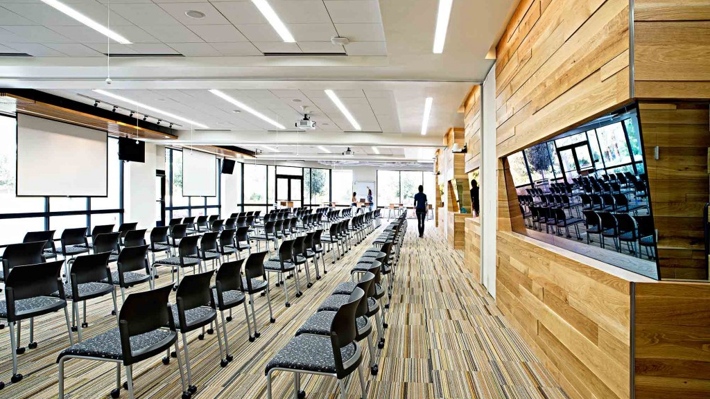 A room with a large table and chairs.
