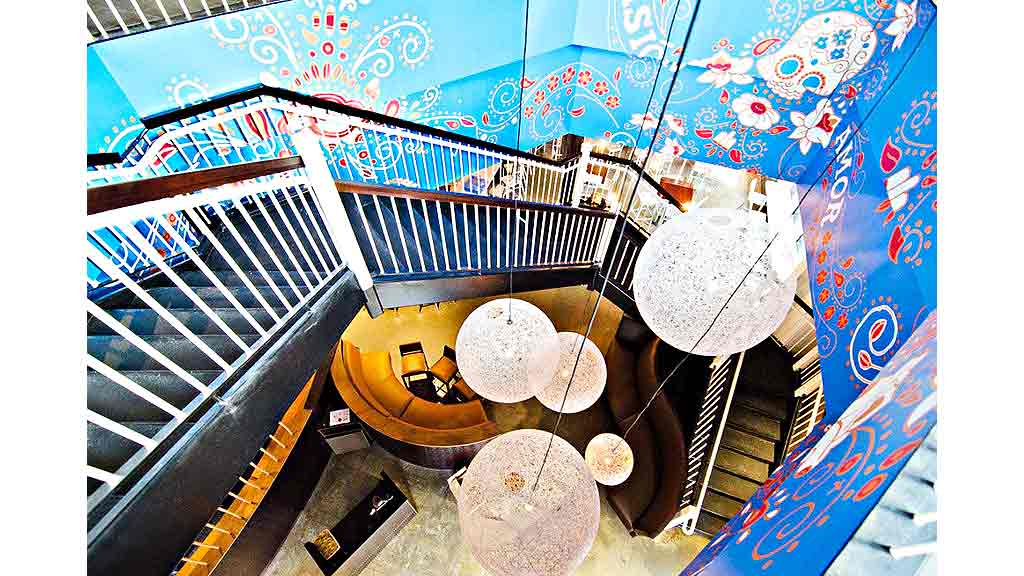 A group of white objects sit on a bench.