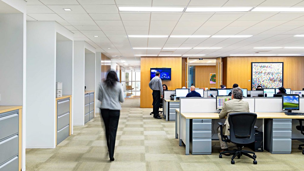 A group of people in an office.