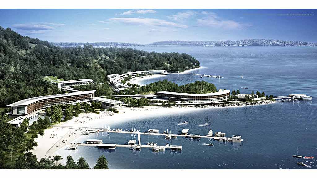 A body of water with buildings and trees around it.