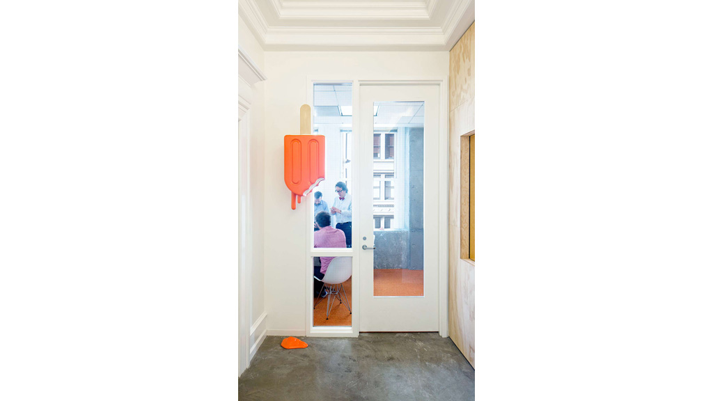 A group of people in a doorway.