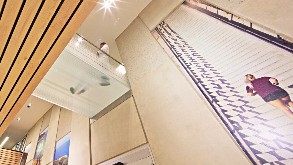 A few people walking down a flight of stairs.