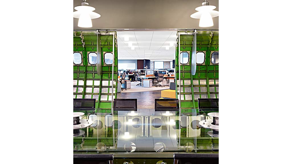 A room with tables and chairs.