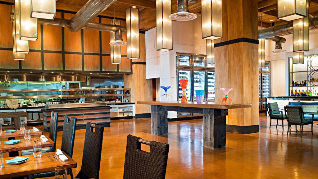 A large restaurant with tables and chairs.