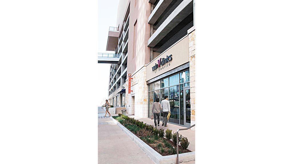 People walking on the sidewalk.