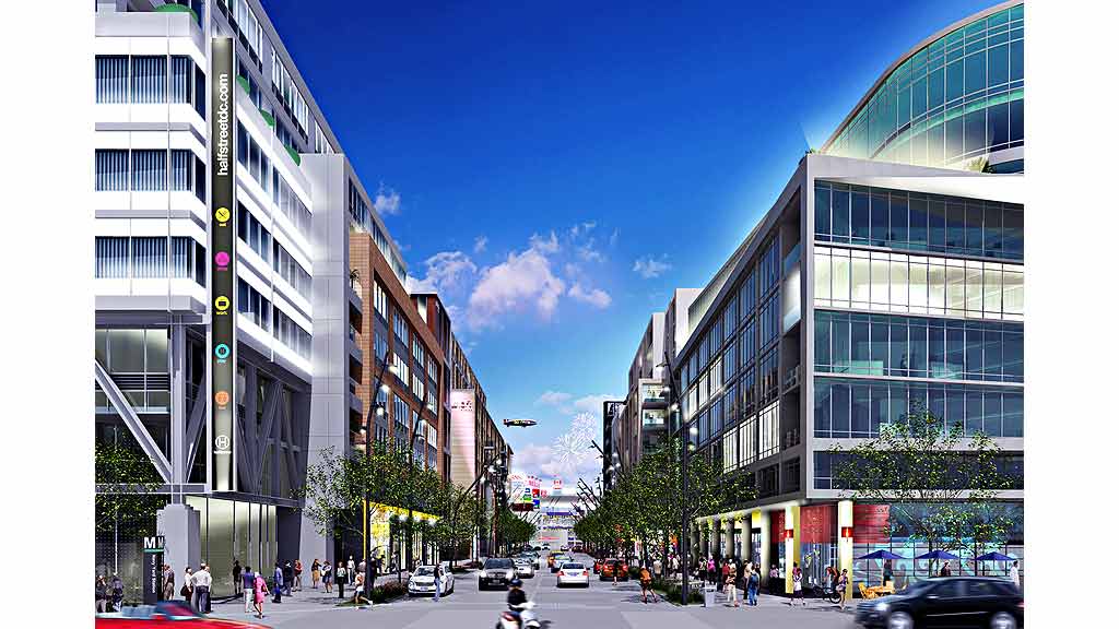 A street with cars and buildings on either side of it.