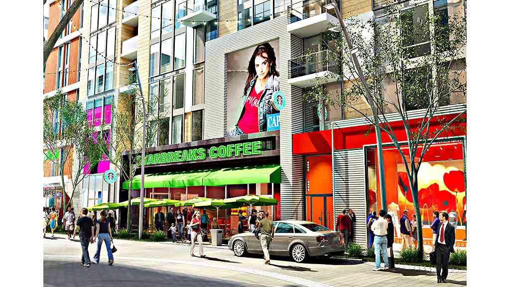 A person on a billboard on a building.