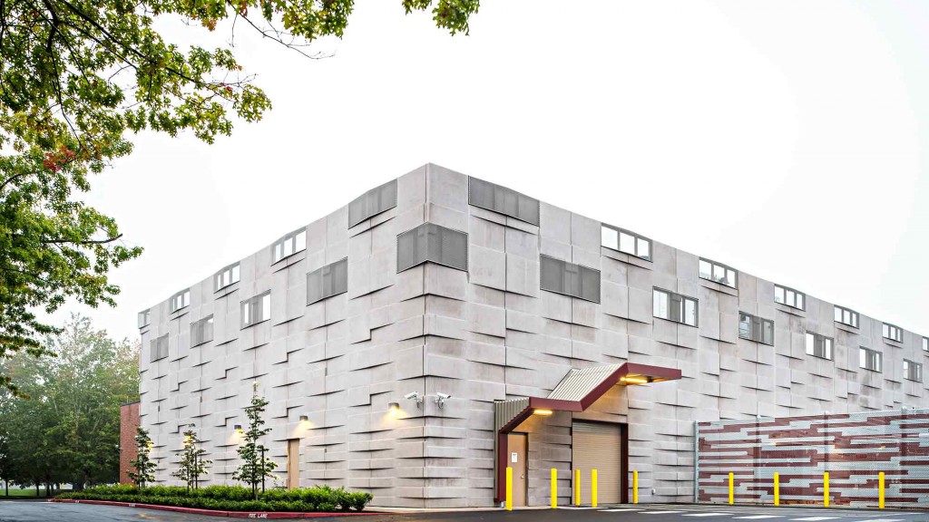 A building with a parking lot.