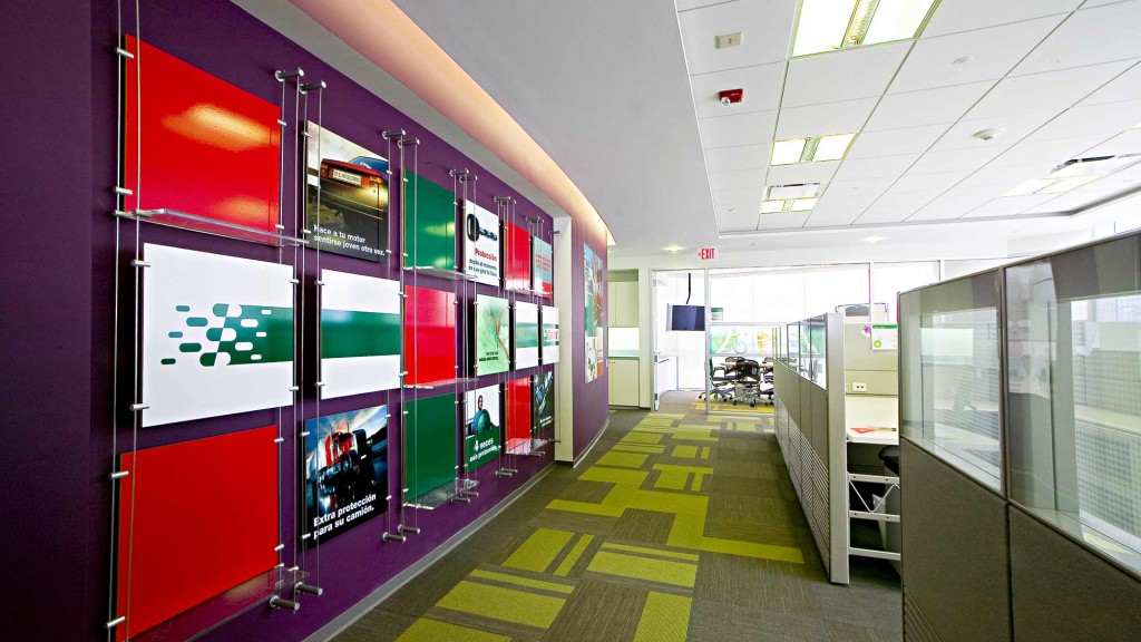 A room with a row of arcade games.