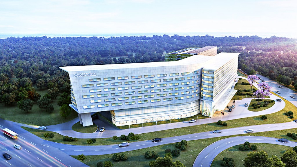 A large building with a parking lot.