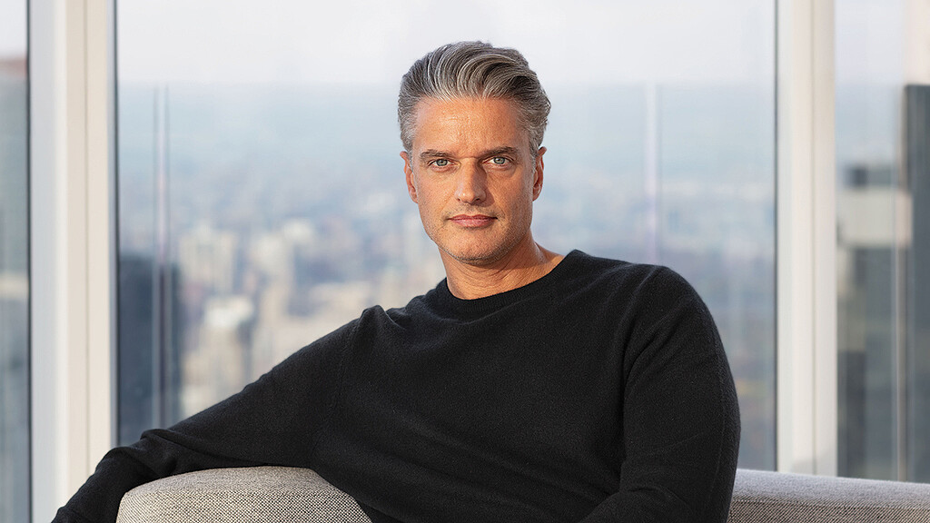 A man sitting in a chair.