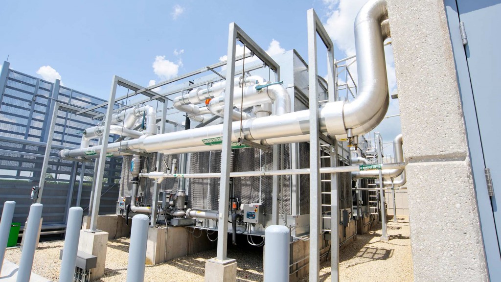 A large white structure with pipes.