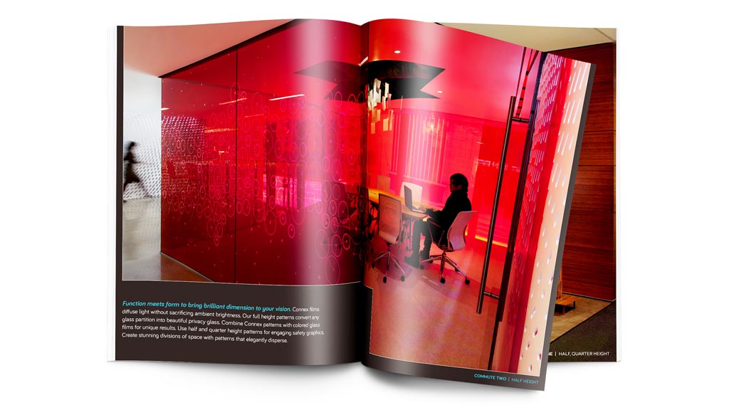 A red rectangular box with a person sitting at a desk.