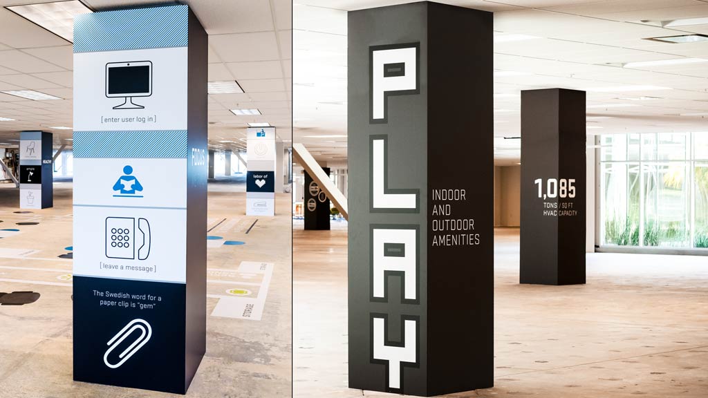 A few large boxes in a building.