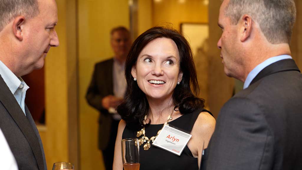 A woman smiling at a man.