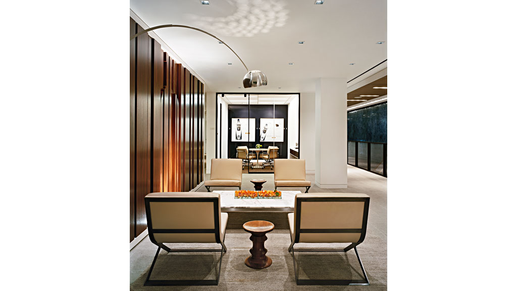 A room with chairs and a table.