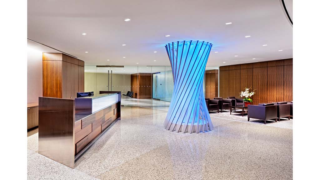 A room with a blue curtain.