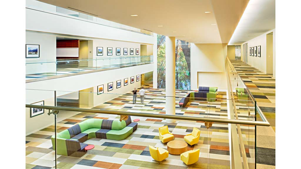 A lobby with a large glass front.