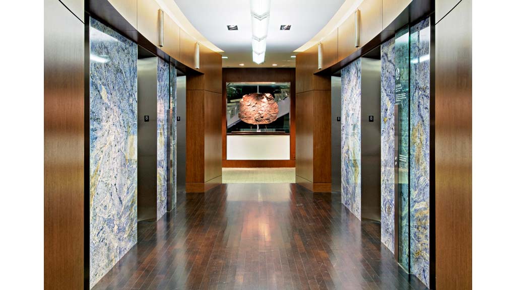 A room with a fireplace and a tv.