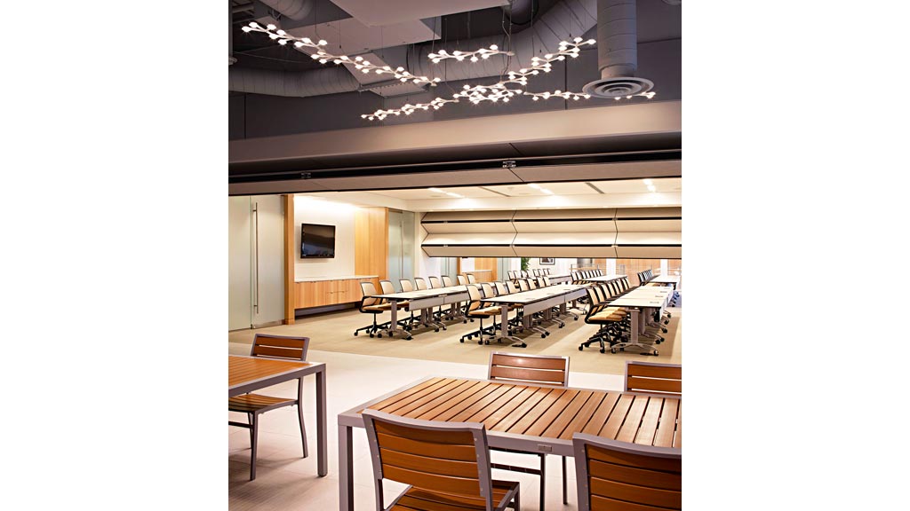 A room with tables and chairs.