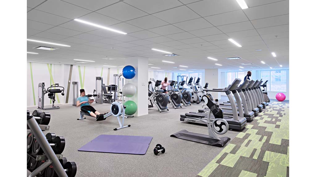 People exercising in a gym.