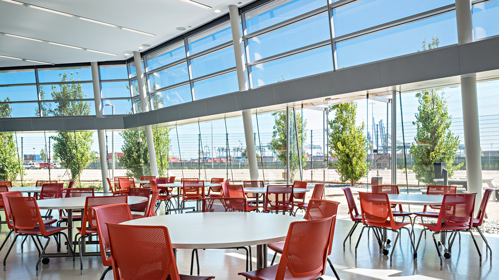 A room with tables and chairs.