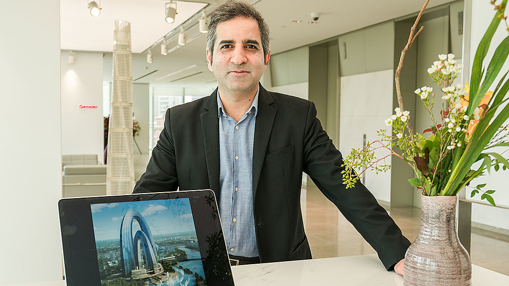 A man sitting at a desk.