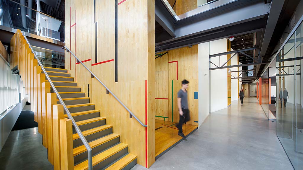 A person walking down a flight of stairs.