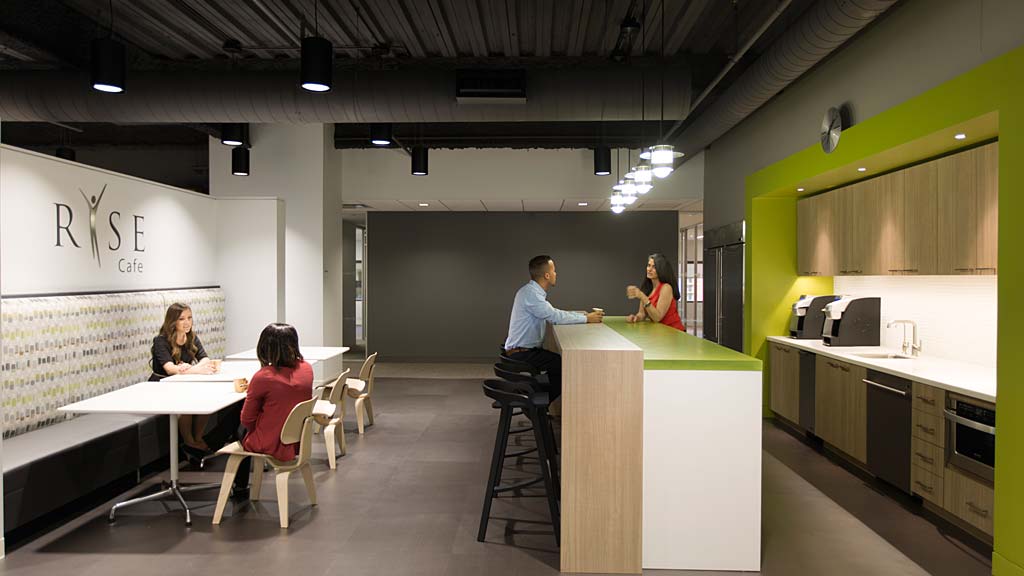 A group of people in an office.