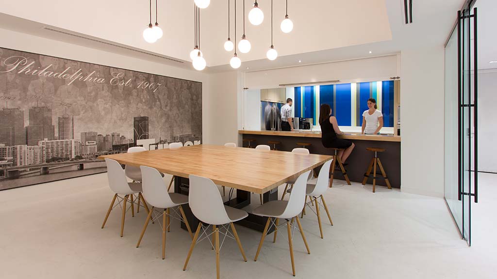 A room with tables and chairs.