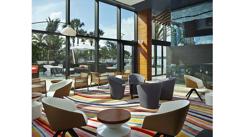 A room with chairs and tables.