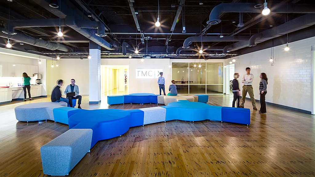 A group of people in a room.