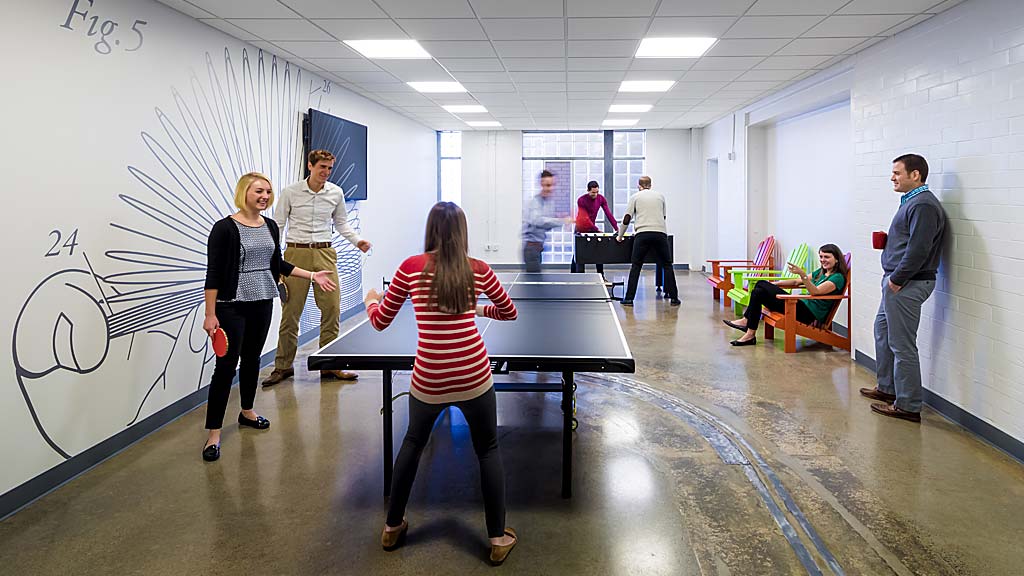 A group of people in a room.