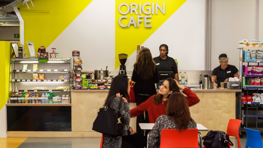 A group of people at a counter.