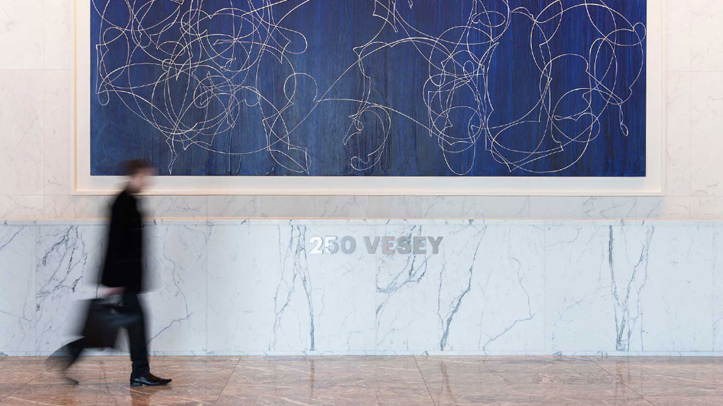 A person walking on a sidewalk.