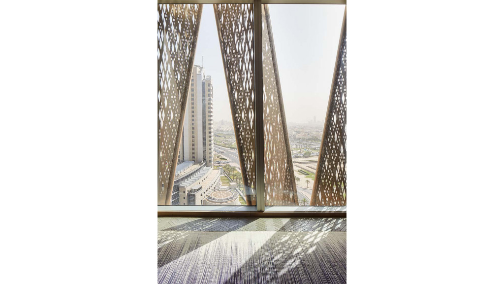 A tall building with a tall tower.