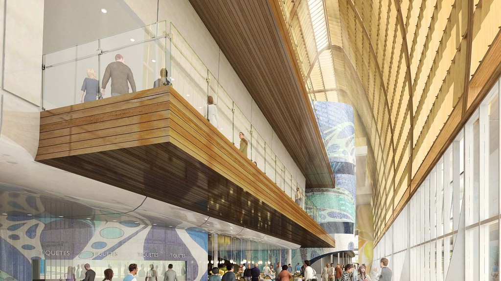 A group of people walking in Pulkovo Airport with a curved ceiling.