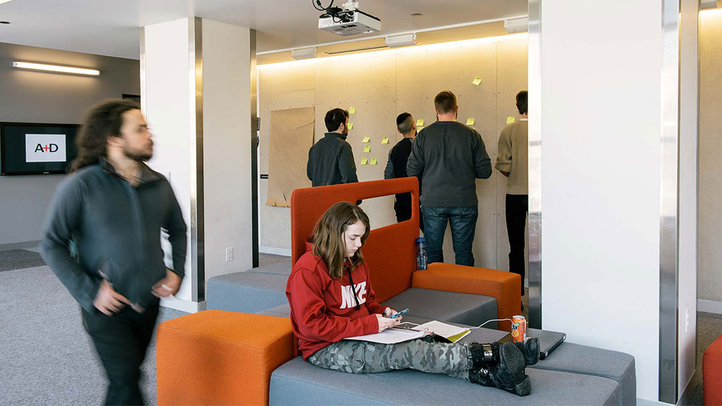 A group of people in a room.