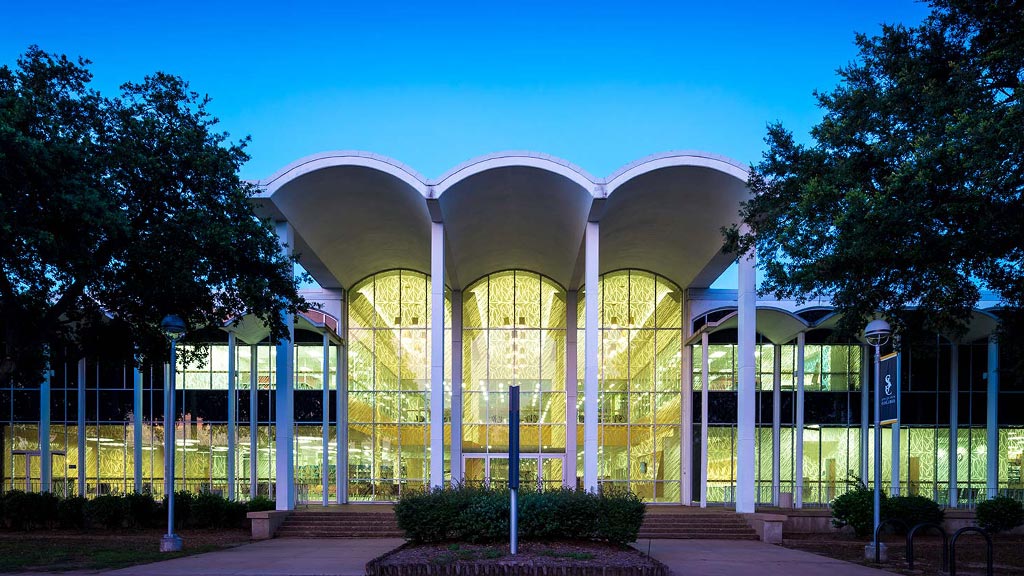 A building with a large glass front.
