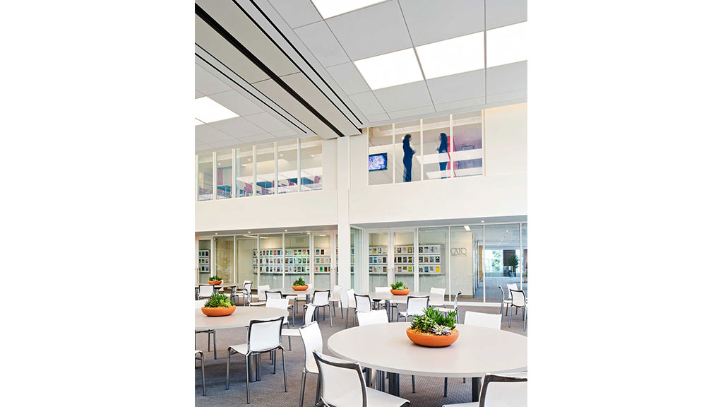 A room with tables and chairs.