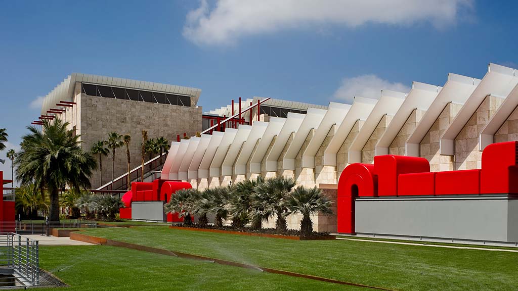 Los Angeles County Museum of Art with a lawn and trees.