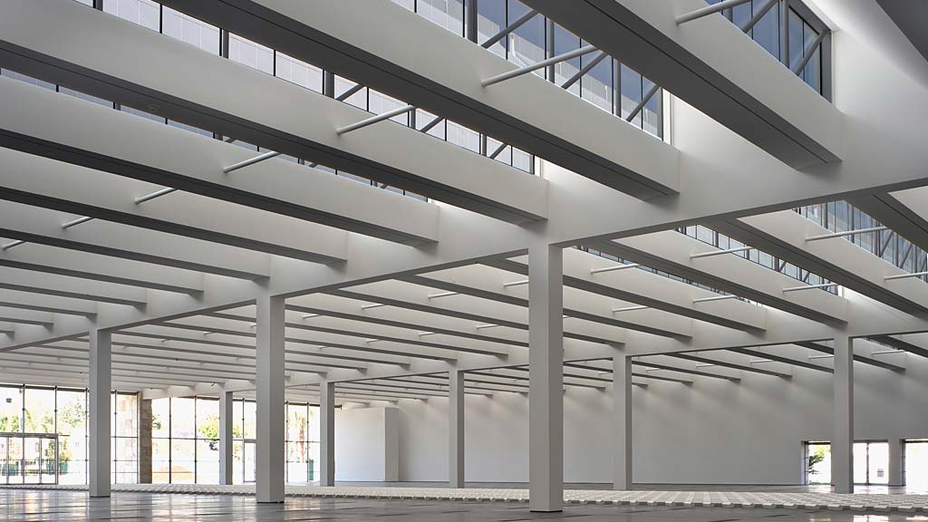 A white building with glass walls.