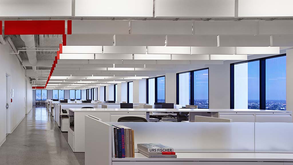 An office with a few computers.