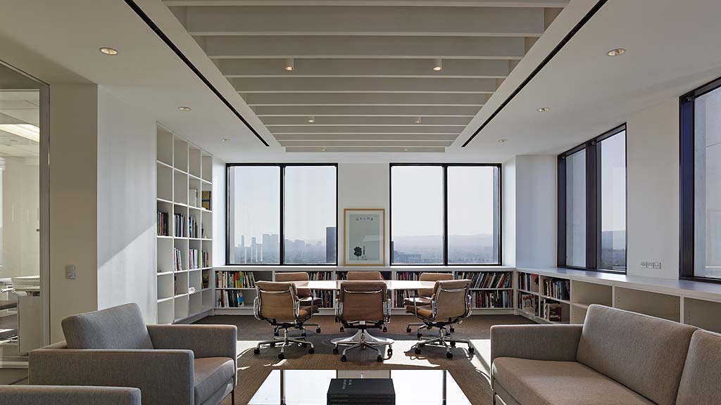 A room with a table and chairs.