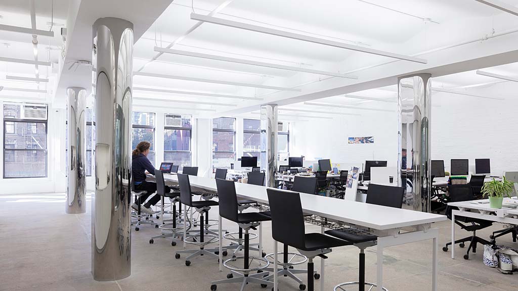 A person sitting at a desk.