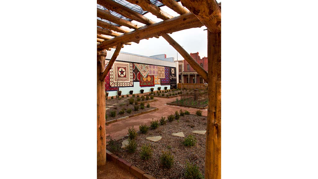 A garden with a sign.