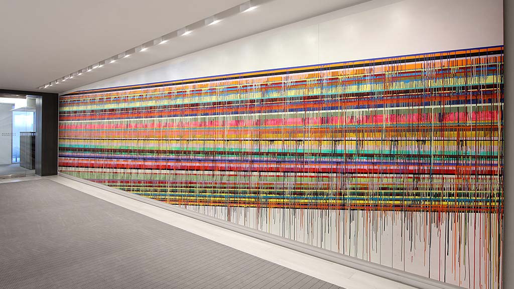 A wall with a painting on it.