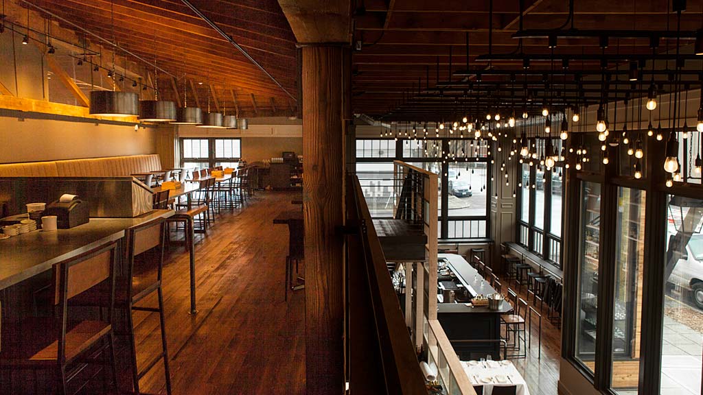 A room with tables and chairs.